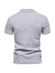 Men's light gray cotton blend casual polo shirt with notched collar and short sleeves.