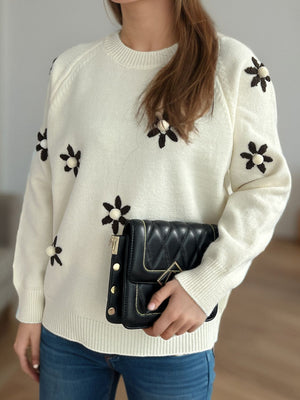 Cream embroidered floral raglan knit sweater with beaded flower details.