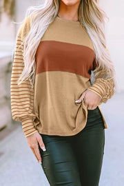 Maternity bishop sleeve shirt in mustard with colorblock and striped sleeves, crew neck.