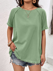 Light green raglan sleeve tee with fringed hem and cuffs.