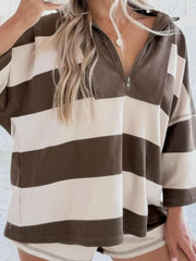 Quarter-zip sweatshirt with brown and cream stripes, corduroy collar detail, and relaxed fit.