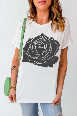 White t-shirt with a distressed charcoal rose graphic and rolled sleeves.