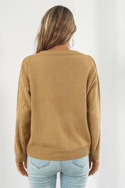 Camel v-neck knit pullover sweater with heart stitch detail on sleeves.