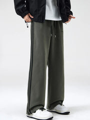 Men's army green sweatpants with black side stripes and drawstring waist