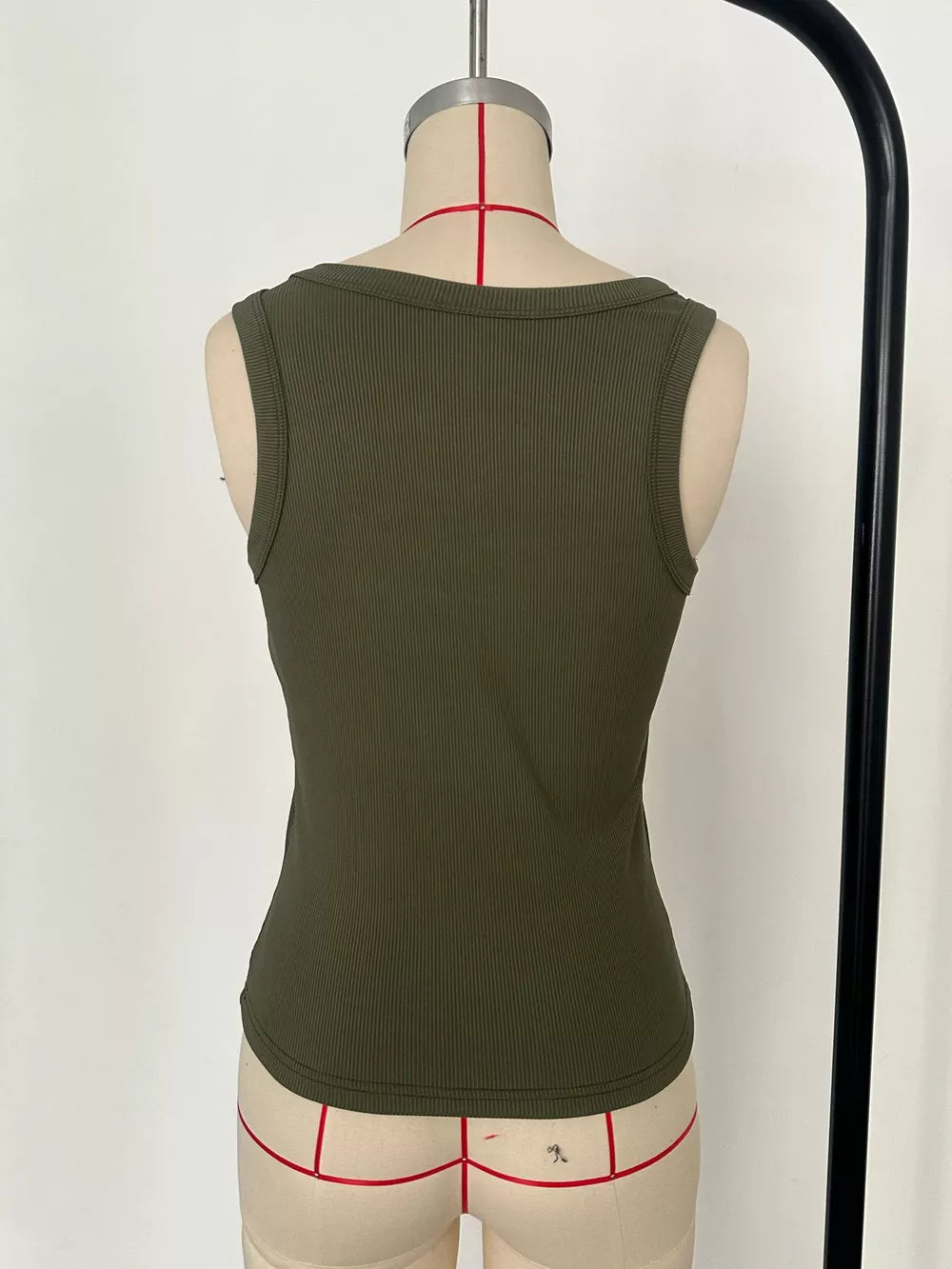 Army green ribbed knit tank top with a square neckline and cropped fit.