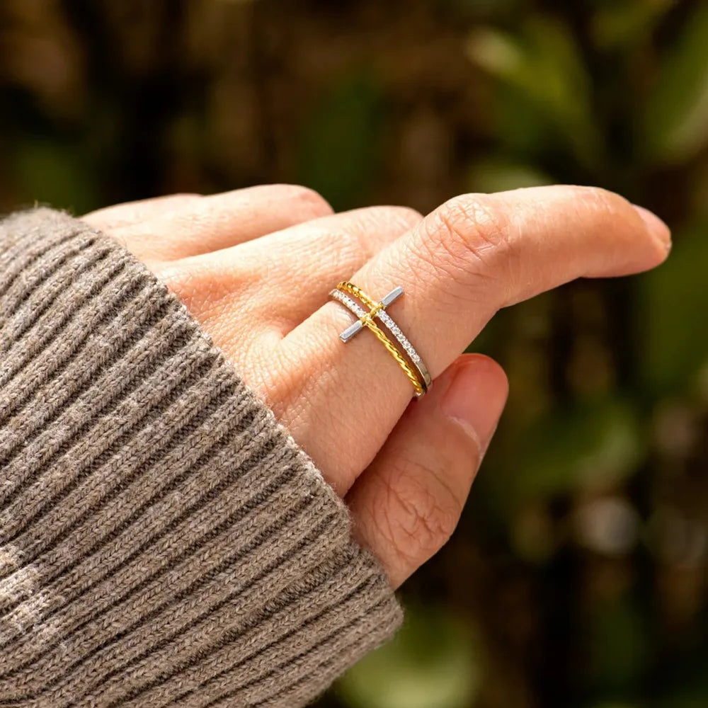 Gold crossbar duo ring with two bands, one gold, one silver with crystals.