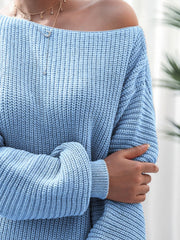 Off-shoulder ribbed knit mini dress in Pastel Blue, 100% acrylic, with a relaxed fit and long sleeves.