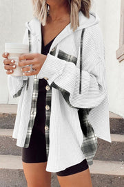 White waffle knit shacket with plaid trim, button front, and hood.
