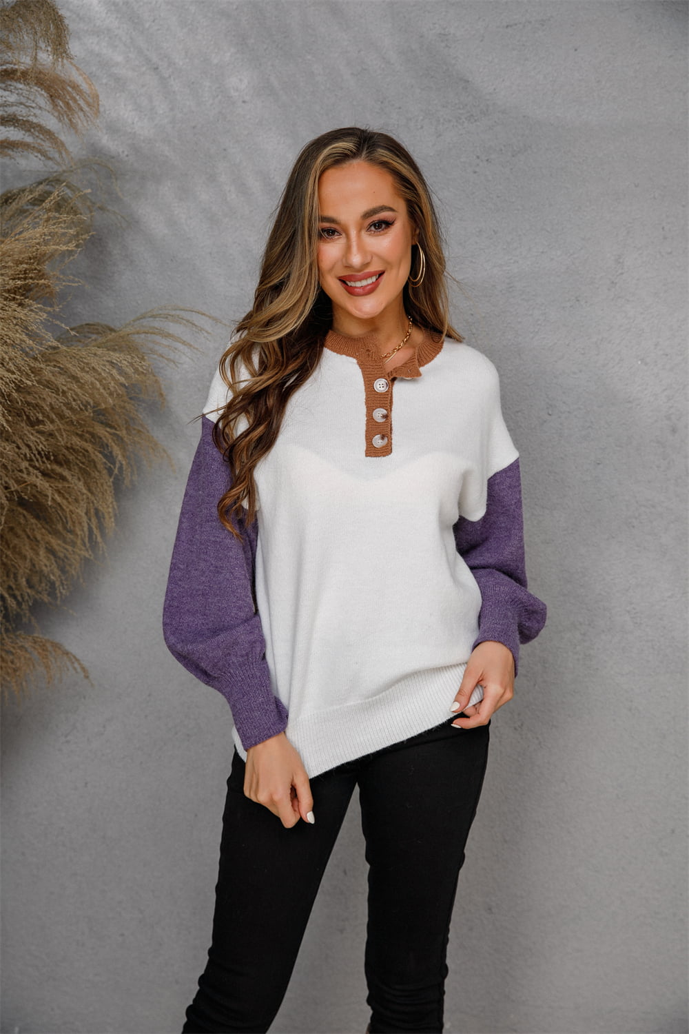 Colorblock henley knit sweater with button detail, white and purple acrylic.