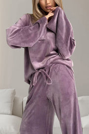 Mauve velvet lounge set with wide sleeve top and drawstring pants.
