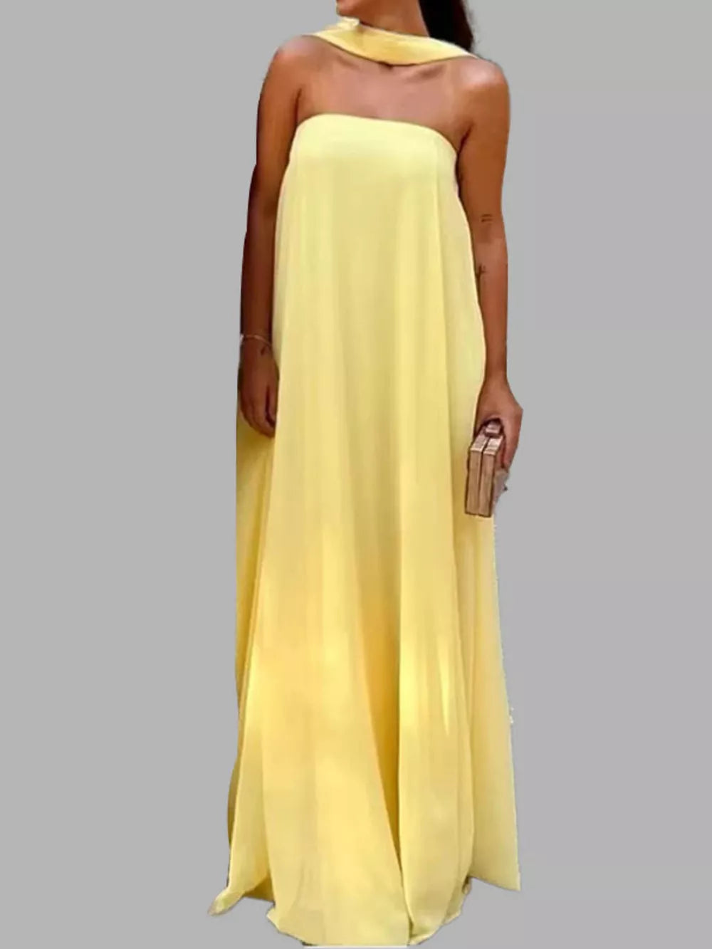 Yellow flowing maxi dress with scarf, strapless, casual style.