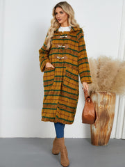 Tartan toggle hooded coat in mustard with green stripes, featuring wooden toggles and front pockets.
