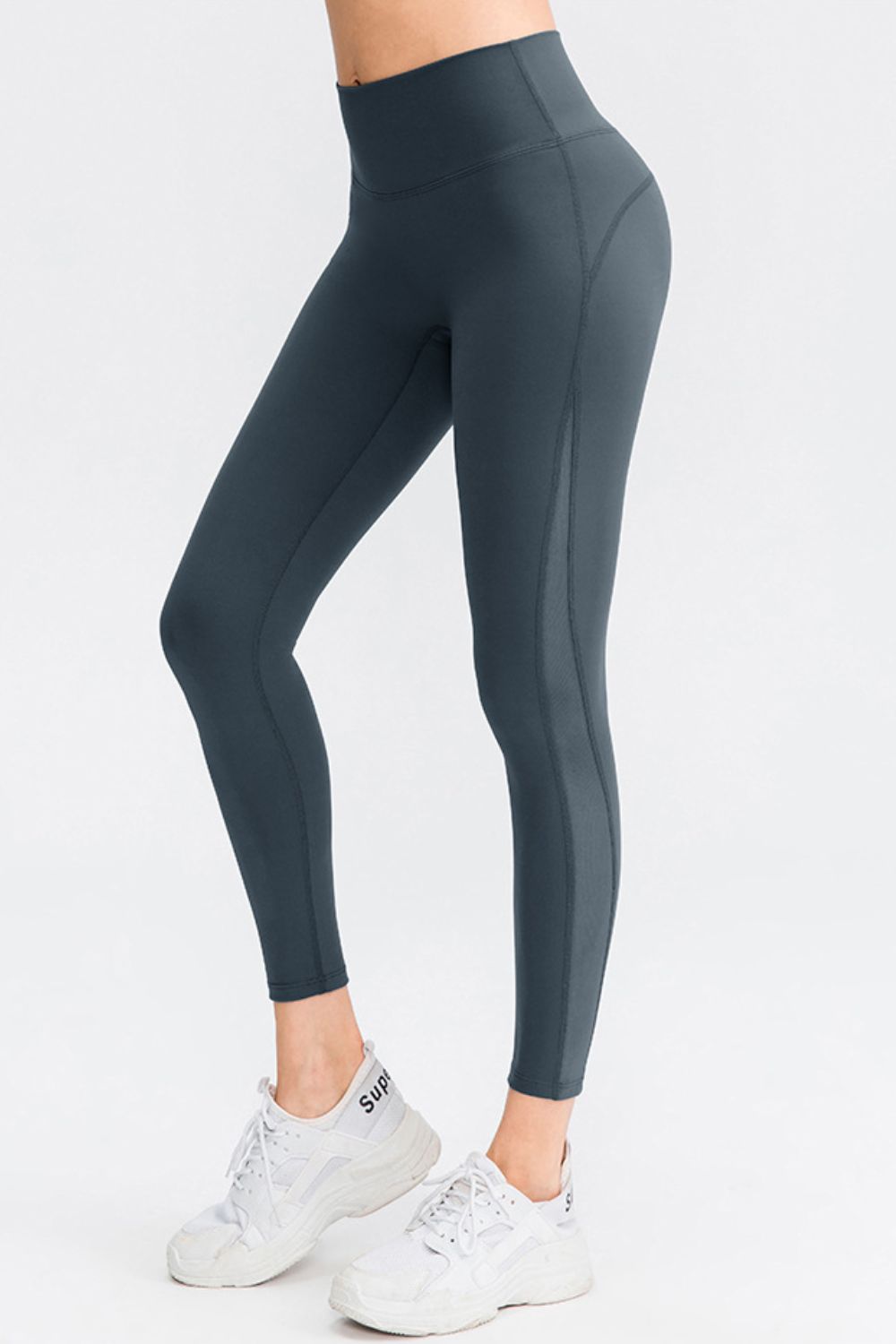 Mesh panel performance leggings in Dark Gray with a high waist and athletic fit.