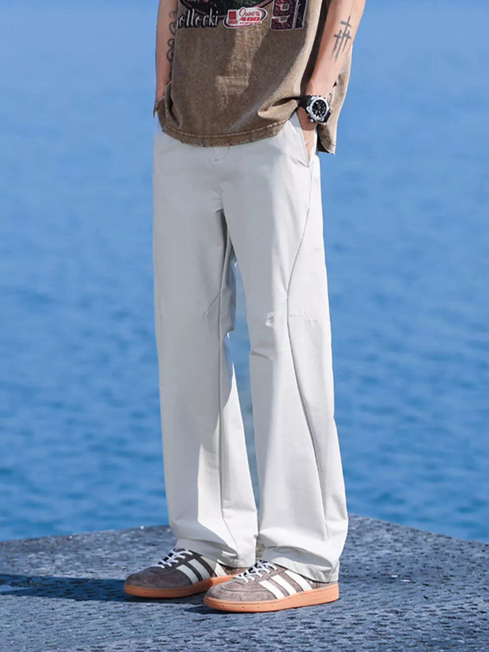 Men's relaxed fit lightweight joggers in white with a straight leg cut.
