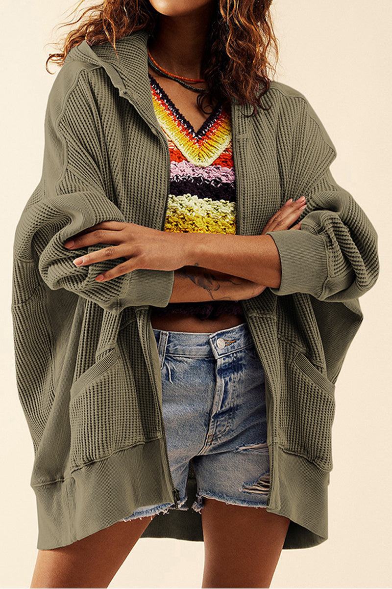 Army green waffle knit zip-through hoodie with pockets and a hood.