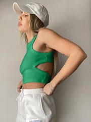 Mid green ribbed crop top with cutout sides and a racerback.