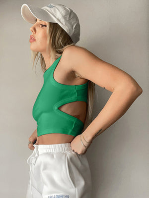 Mid green ribbed crop top with cutout sides and a racerback.