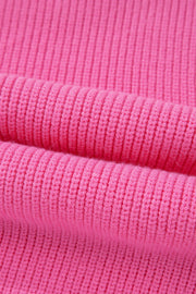 Fuchsia pink ribbed knit vest detail showing textured fabric.