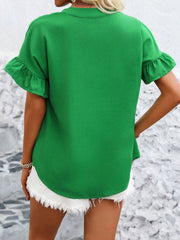 Green blouse with ruffle sleeves and gathered yoke detail.