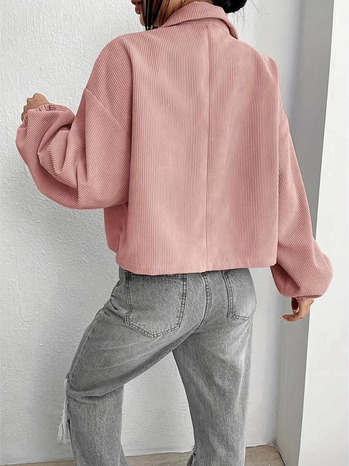 Pale blush corduroy blouson jacket with balloon sleeves and a cropped length.
