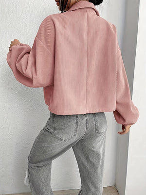 Pale blush corduroy blouson jacket with balloon sleeves and a cropped length.