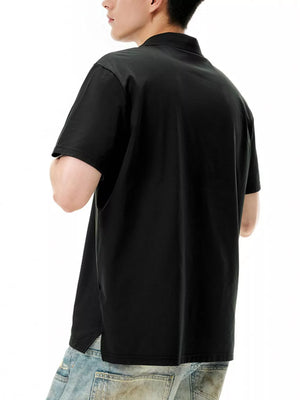 Black short sleeve polo shirt with classic fit and side vents, made of 100% polyester.