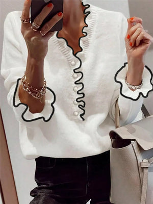 Chic white knit sweater with ruffled V-neck and cuffs, pearl buttons, acrylic.