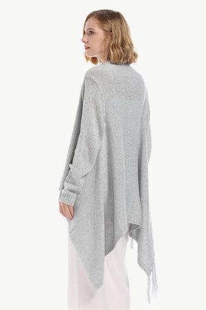 Gray asymmetric fringe knit cardigan with a draped hem and tassel details.