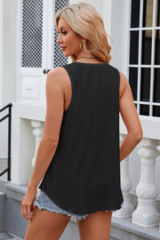 Black eyelet scoop-neck trapeze tank top with a relaxed fit.