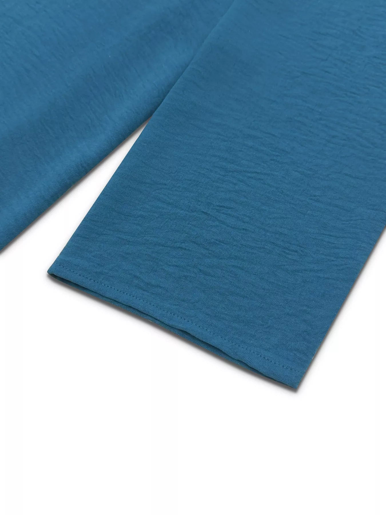 French blue textured maxi dress with button-down detail and drawstring waist.