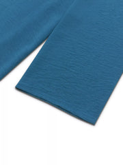 French blue textured maxi dress with button-down detail and drawstring waist.