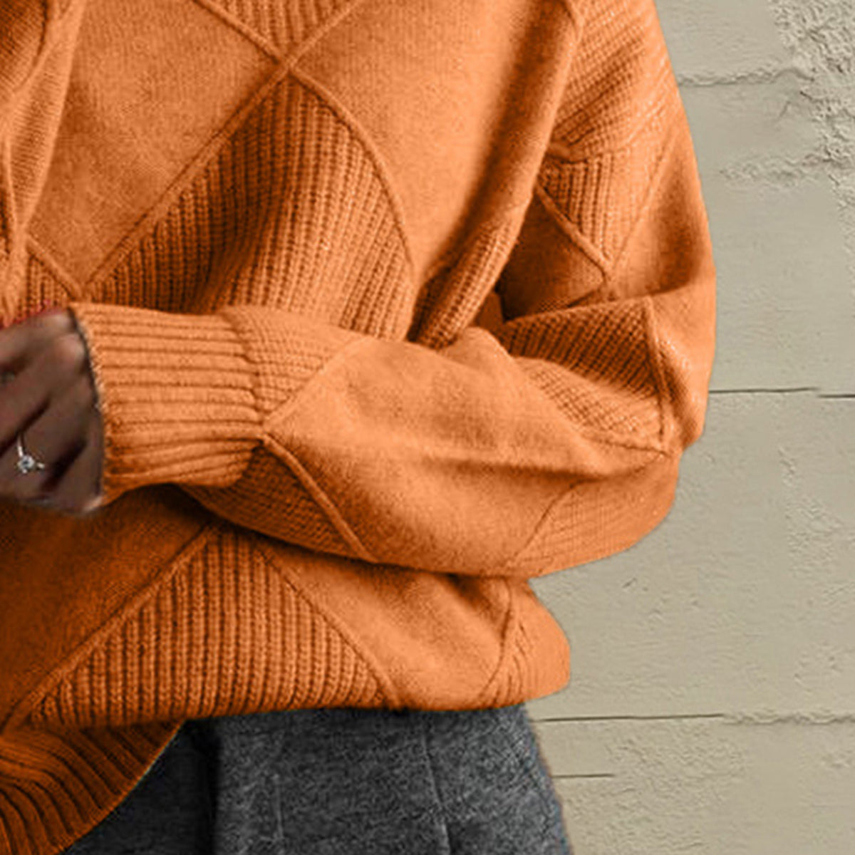 Textured diamond knit pullover sweater in caramel with ribbed cuffs and hem.