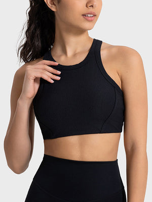 Black ribbed racerback crop top with contour stitching and a high neckline.