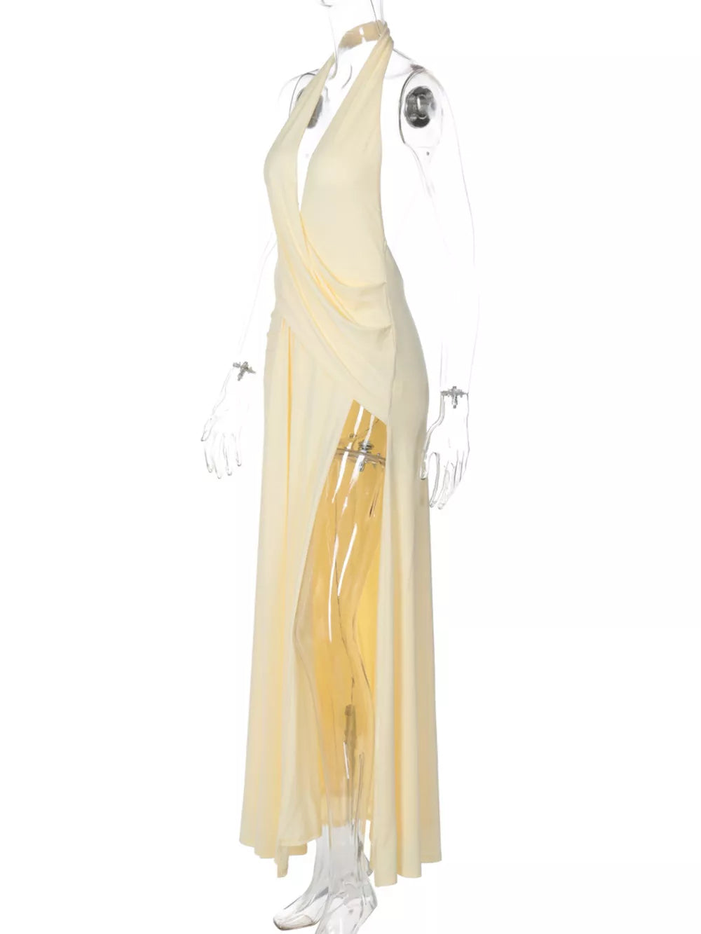 Yellow halter neck ruched maxi dress with a deep V-neck and high slit.