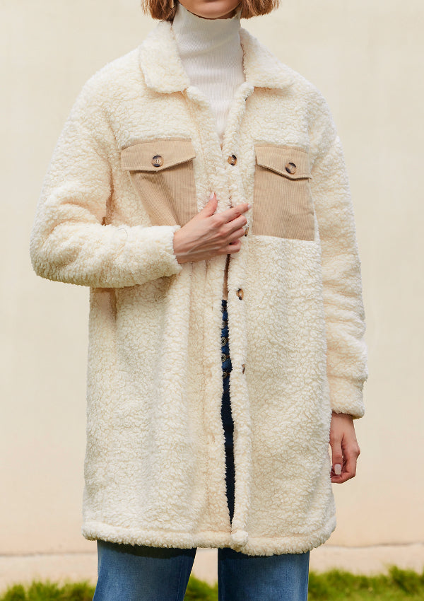 Beige sherpa coat with corduroy patch pockets and button front.