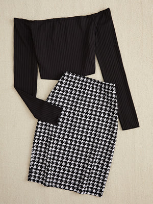 Black houndstooth pencil skirt and ribbed off-shoulder long sleeve top.