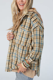 Textured plaid hooded overshirt with raw hem and button-up front.