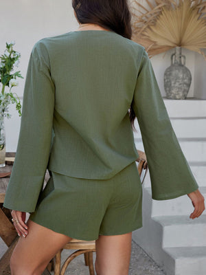 Linen tie-front top and shorts set in Matcha Green with bell sleeves and relaxed fit shorts.