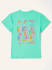 Aqua graphic tee with "Grateful Thankful Blessed" text and positive affirmations.