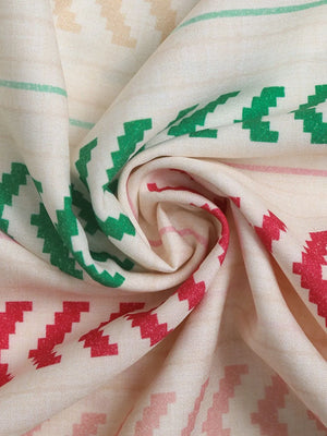 Chevron stripe tiered maxi skirt in multicolor fabric with red, green, and tan geometric patterns.