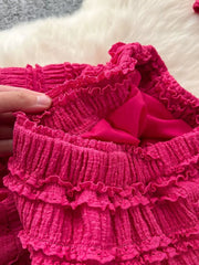 Rose Red textured two-piece set with tiered ruffles and frill details.