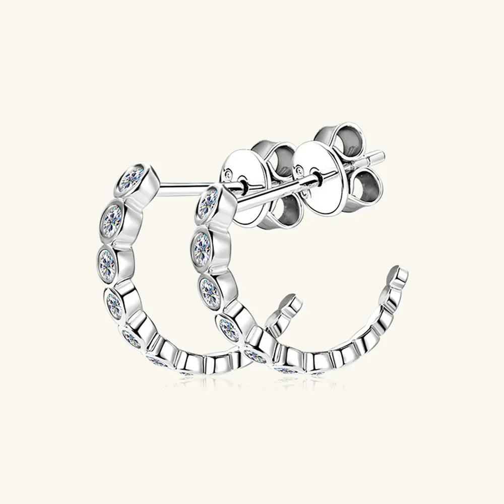 Silver hoop earrings with pavé moissanite stones and butterfly backs