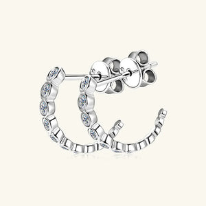 Silver hoop earrings with pavé moissanite stones and butterfly backs