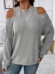 Gray ribbed mock neck cold shoulder top with long sleeves.
