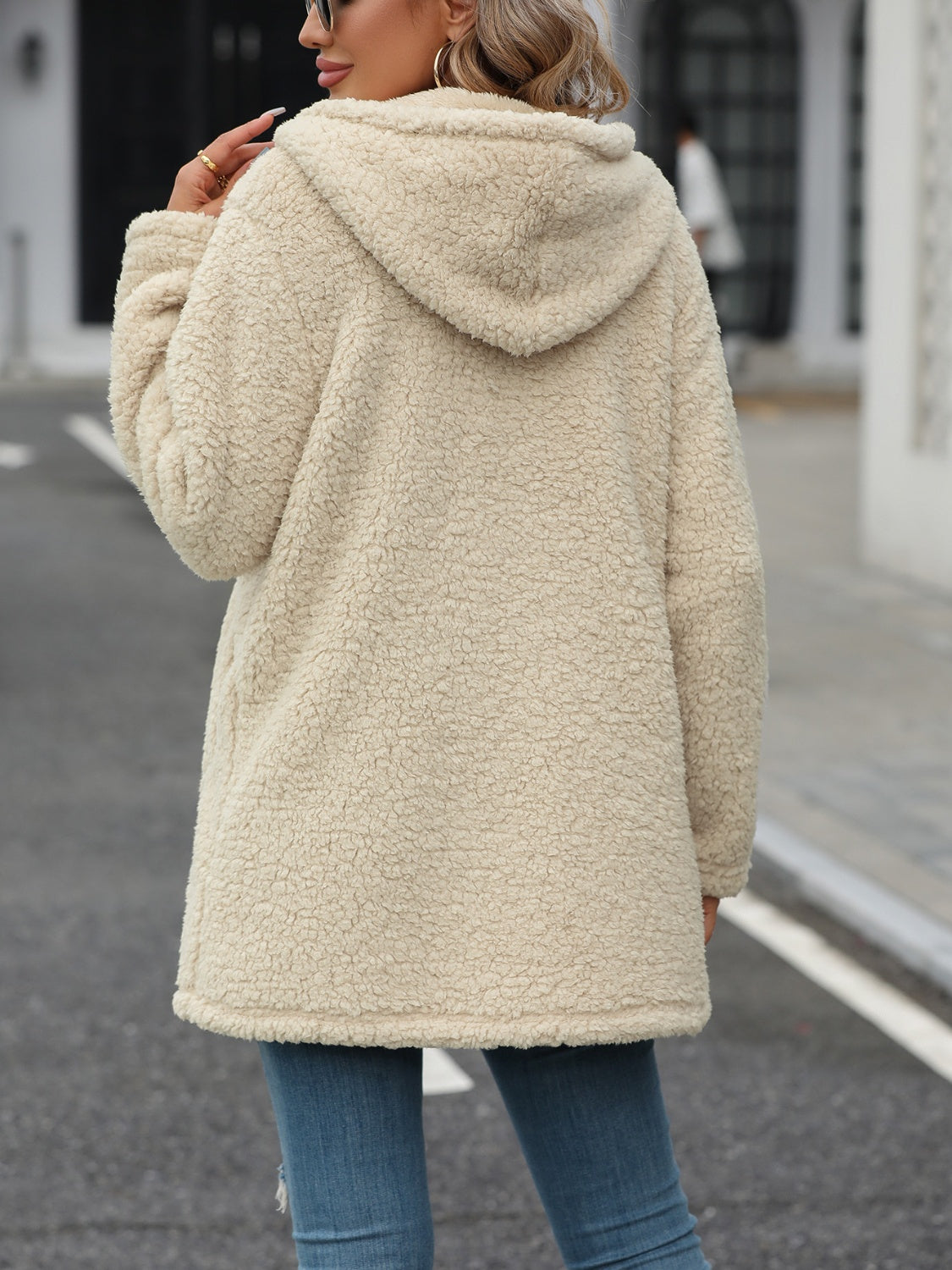 Cream teddy hoodie with quilted panels and hood, casual chic outerwear.