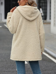 Cream teddy hoodie with quilted panels and hood, casual chic outerwear.