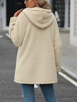 Cream teddy hoodie with quilted panels and hood, casual chic outerwear.
