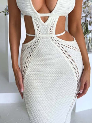 White knitted maxi dress with deep V-neck, cutouts, and backless detail.