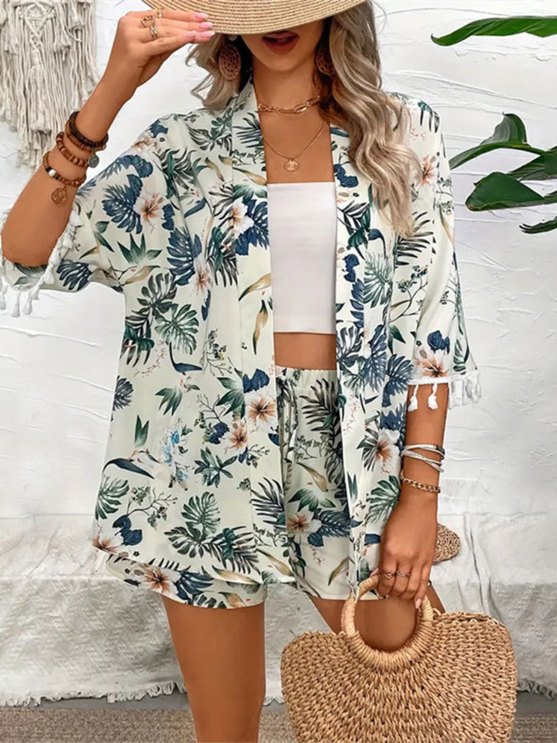 Botanical print kimono and shorts set in light green with tassel trim, styled with a white crop top.