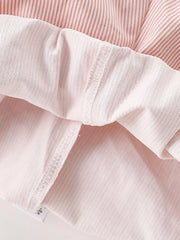 Toddler cotton bubble shorts with pink and white stripes and white trim.